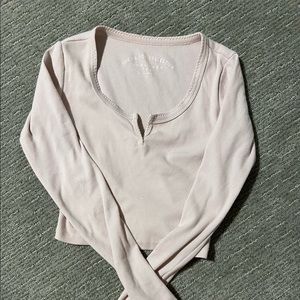 tight crop with a v cut-out